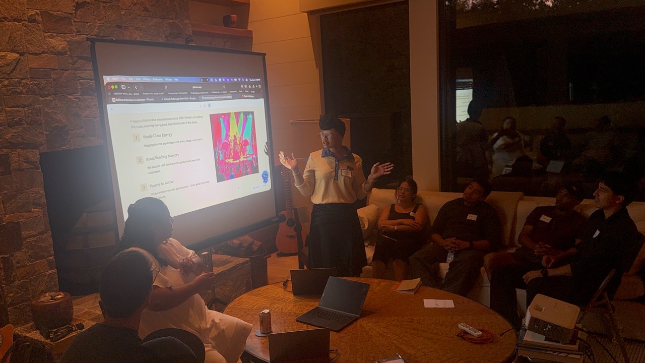 An Eastside alumnus presenting an AI project