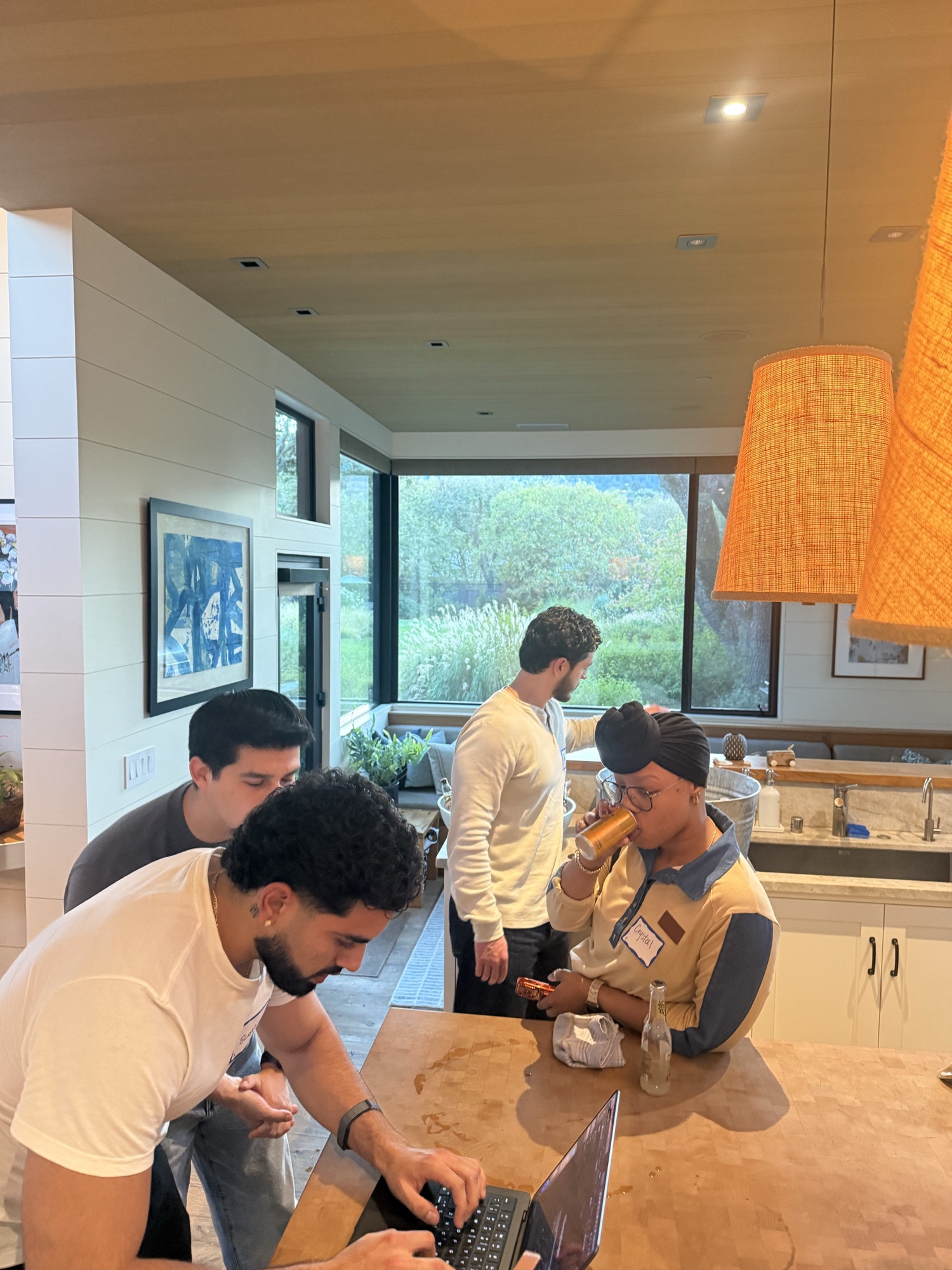 Eastside alumni working alongside a live AI presentation